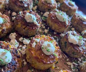 Sweet corn cakes with garlic feta whip
