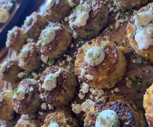 Sweet corn cakes with garlic feta whip
