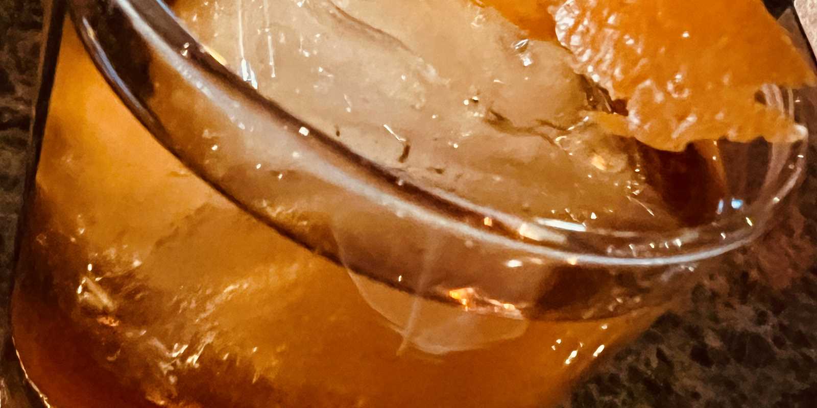 Angel’s Envy Rye with a big rock and orange peel