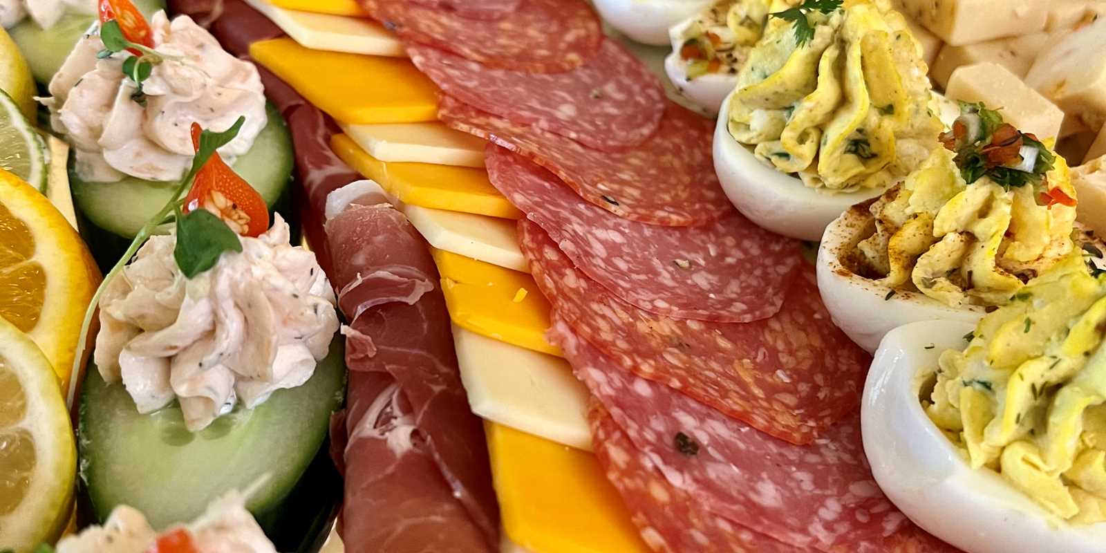 Smoked salmon, deviled eggs, cheese, sausage
