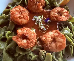 Shrimp diavolo on cloverleaf pasta