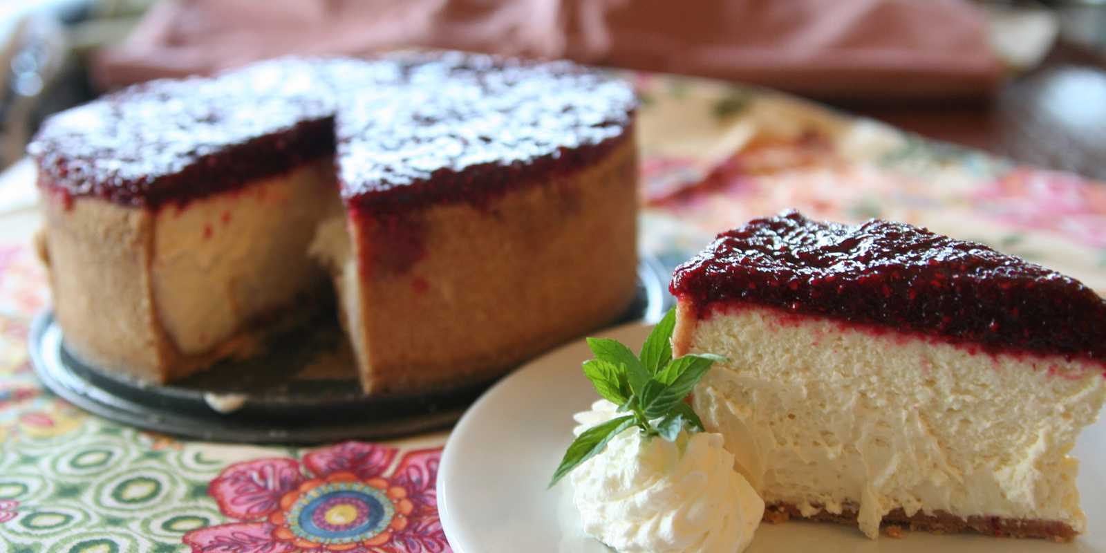 Rich cheesecake with berry jam top
