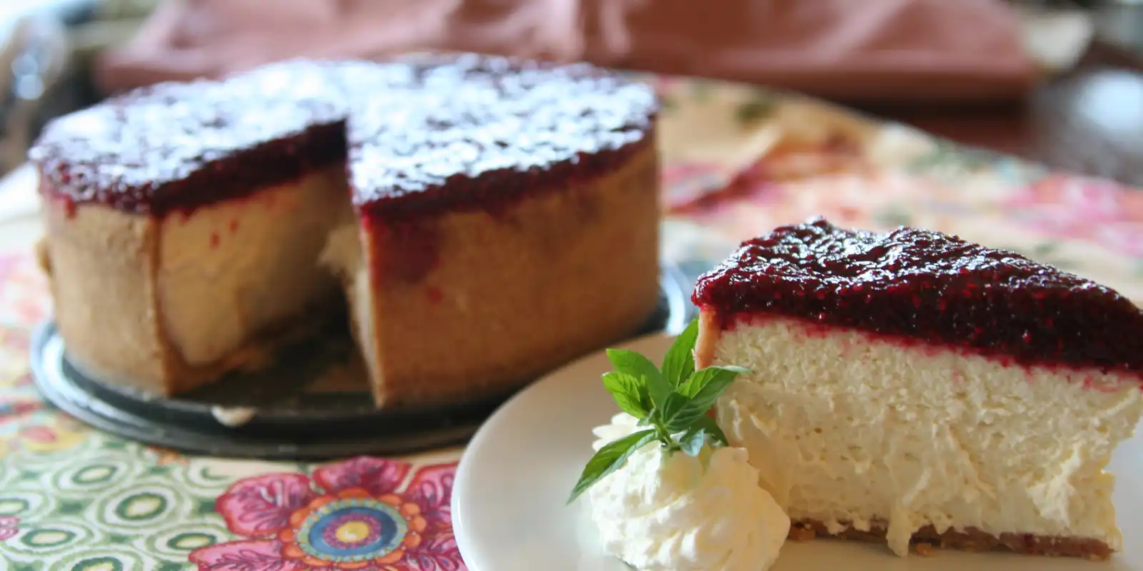 Rich cheesecake with berry jam top