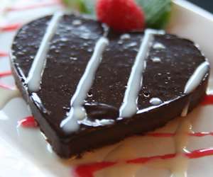 Flourless chocolate cake shaped in a heart for Valentine’s Day